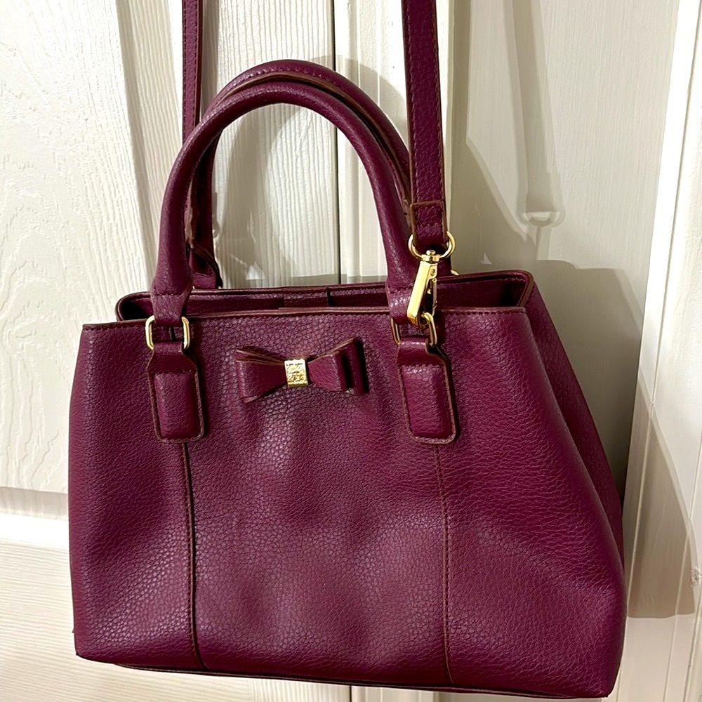 Anne Klein medium size satchel in plum color.